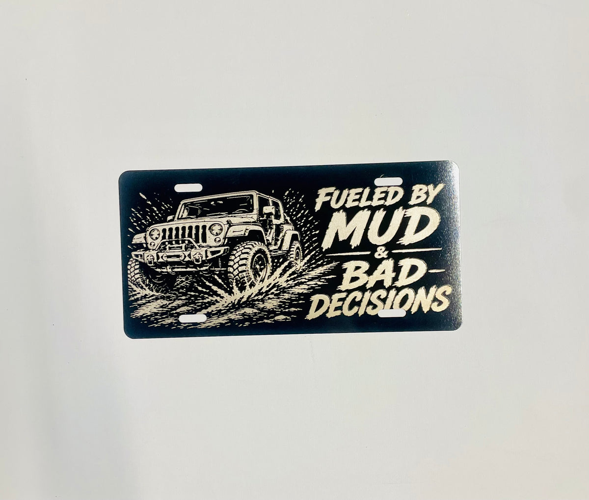 Gloss Black Aluminum Car Tag Laser Engraved "Fueled By Mud & Bad Decisions"