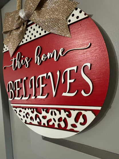 This House Believes Christmas Door Sign